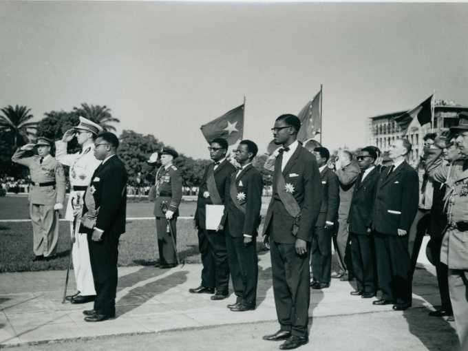 King Baudouin, President Joseph Kasa-Vubu and Prime Minister Patrice Lumumba in front of the equestrian statue of Leopold II in Leopoldville on 30 June 1960